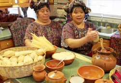 Ixil interpreter Sheba Velasco makes tamales during a Mayan cooking demonstration.